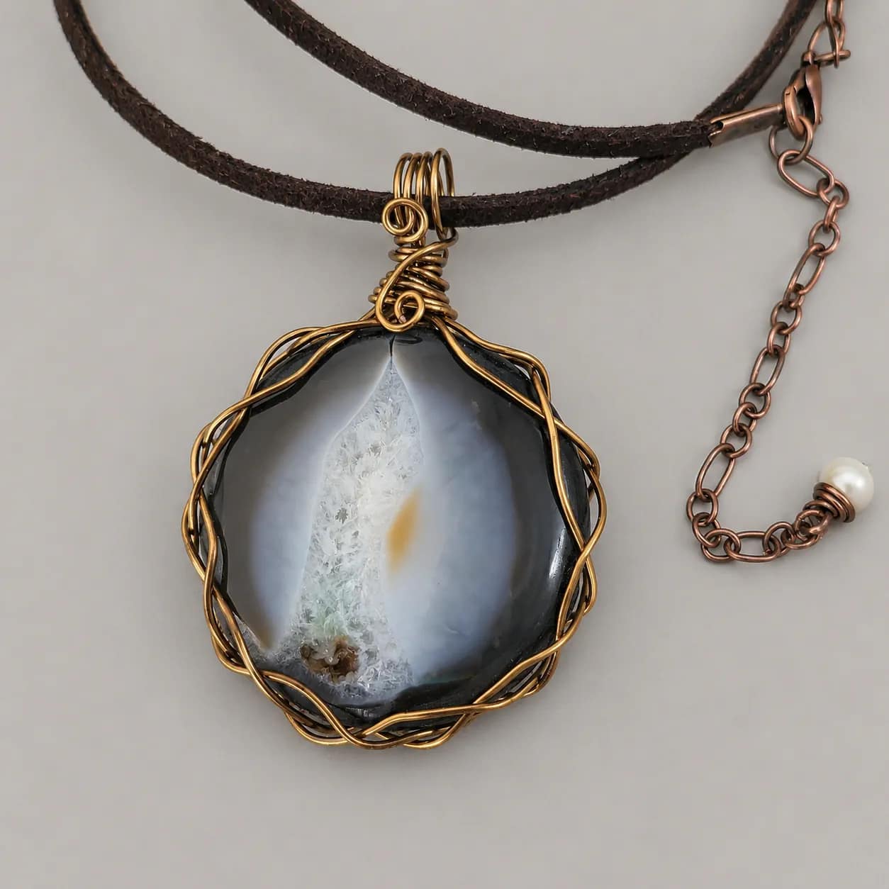 blue and white agate wire wrapped pendant on cord result xnc