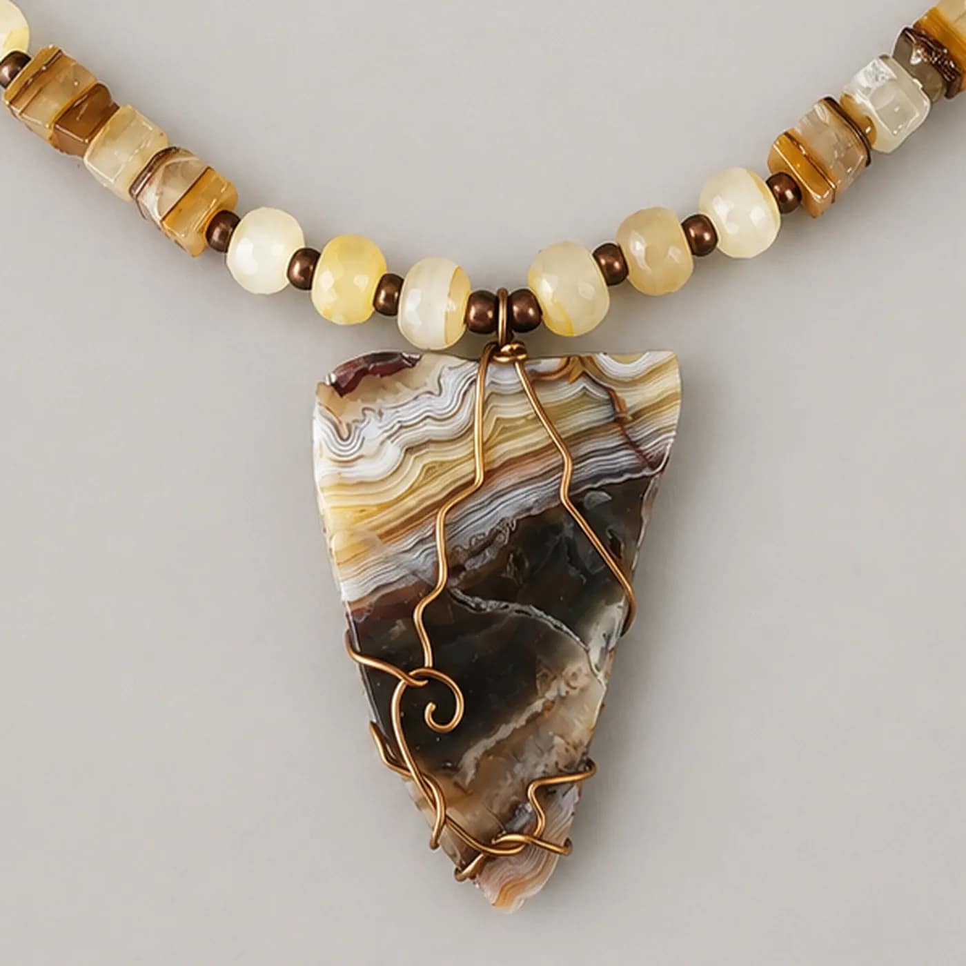 arrow head brown agate necklace close up
