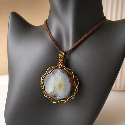 Handmade Jewellery & Stone Library blue and white agate wire wrapped pendant on cord